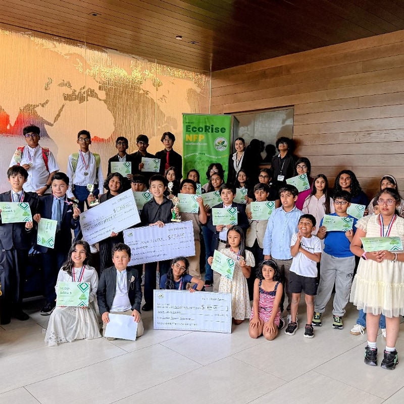 Green Dream winners and competitors posing with certificates and prize checks