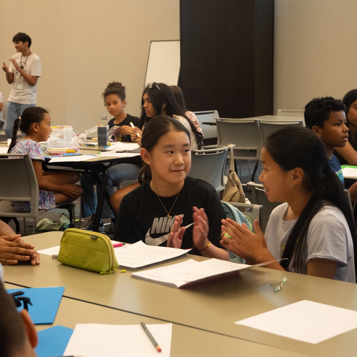 EcoRise campers collaborating during a summer workshop