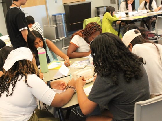 Students collaborating during a sustainability workshop