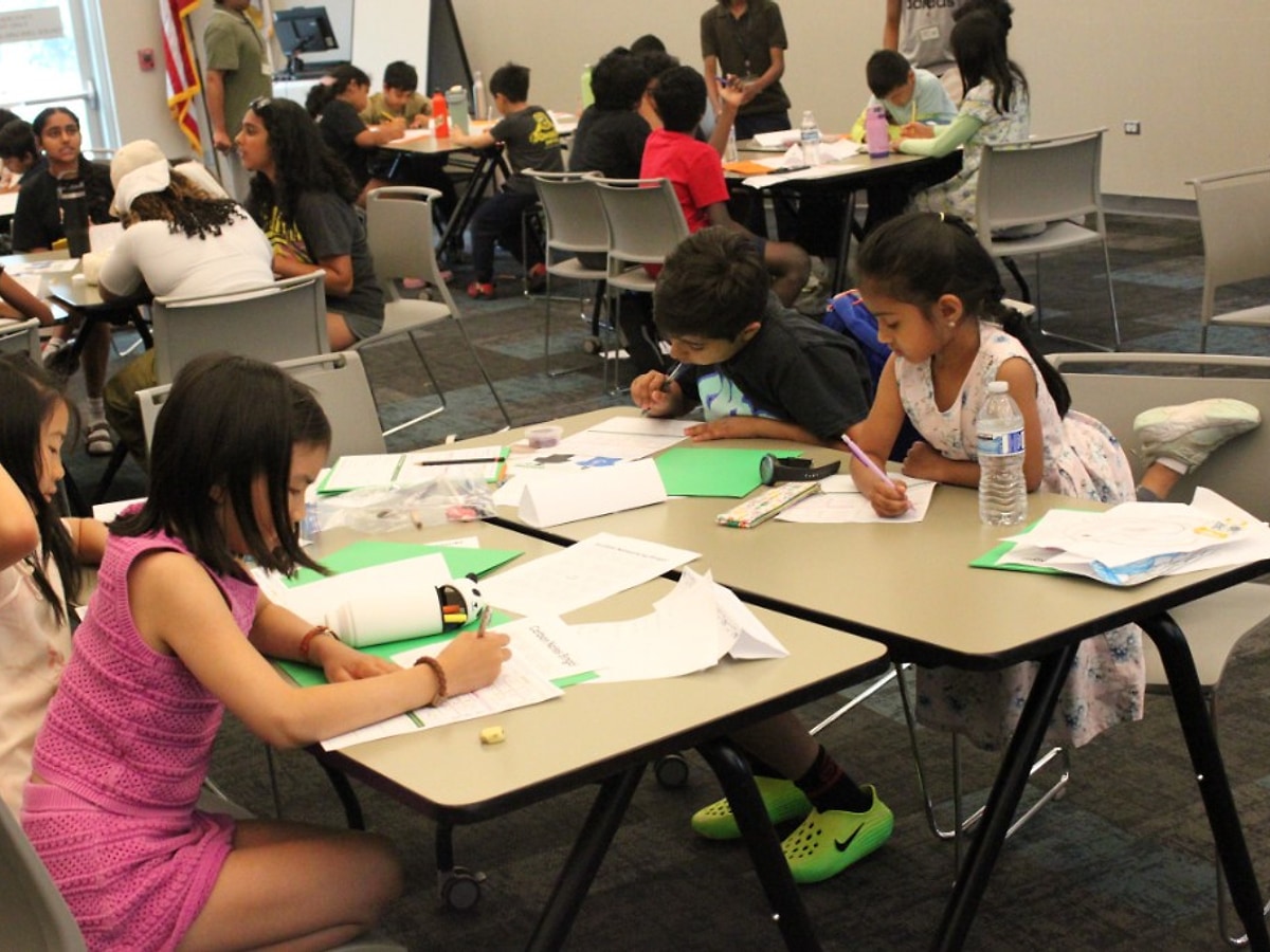 Students collaborating on a camp activity